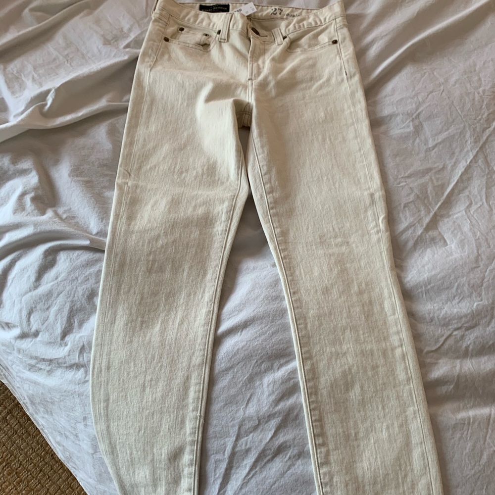 Ivory mid rise skinny toothpick jean
